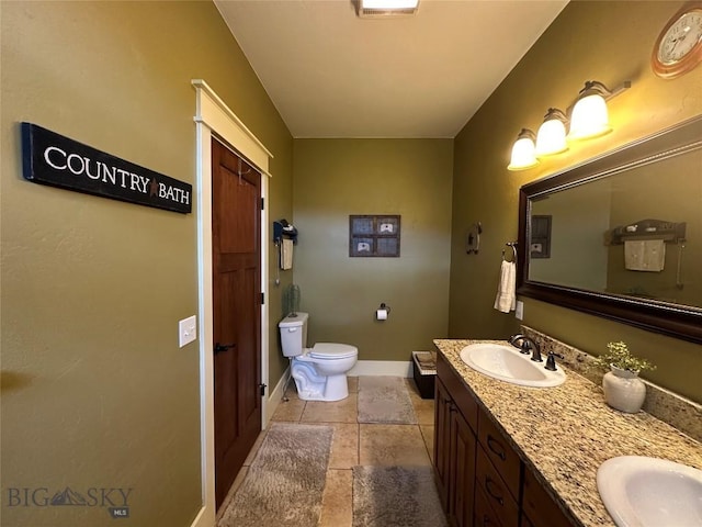 64 Mountain View Trl, White Sulphur Springs, MT 59645 - bathroom with double vanity, stone tile flooring, and a shower