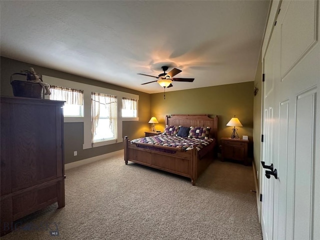 64 Mountain View Trl, White Sulphur Springs, MT 59645 - carpeted bedroom featuring a ceiling fan and baseboards