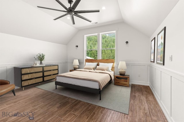 189 Blue Creek Rd, Heron, MT 59844 - bedroom with wood finished floors, lofted ceiling, wainscoting, and ceiling fan