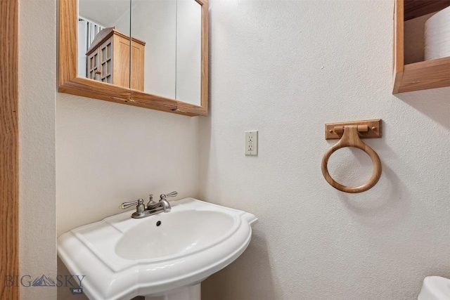 225 Mountain View Dr S, Anaconda, MT 59711 - half bathroom with a sink and toilet