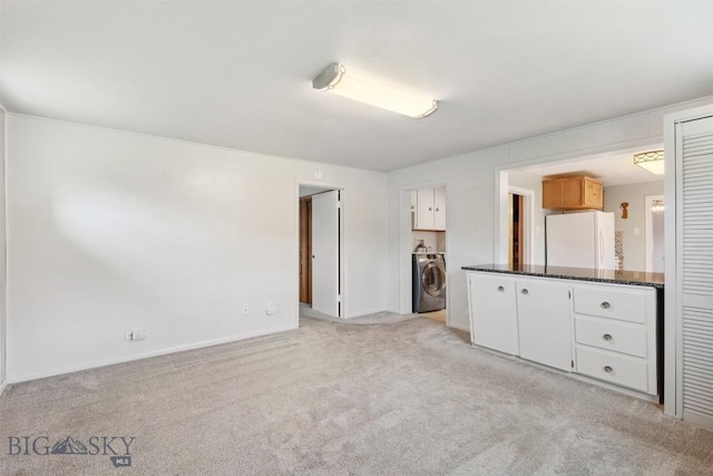 225 Mountain View Dr S, Anaconda, MT 59711 - unfurnished bedroom featuring freestanding refrigerator and light colored carpet