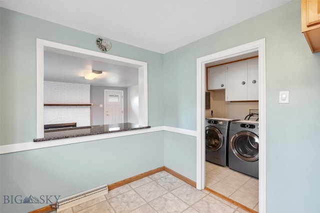 225 Mountain View Dr S, Anaconda, MT 59711 - laundry area with washer and dryer, cabinet space, and light tile patterned floors