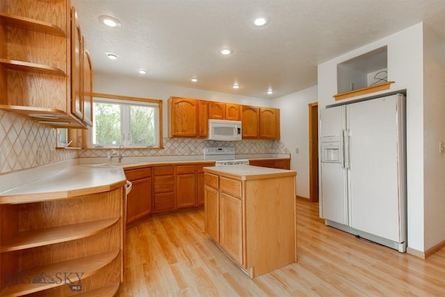 507 E Poppleton, Sheridan, MT 59749 - kitchen with open shelves, white appliances, light wood finished floors, and recessed lighting