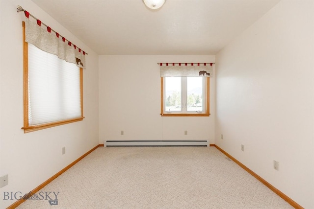 507 E Poppleton, Sheridan, MT 59749 - empty room featuring carpet flooring and a baseboard heating unit