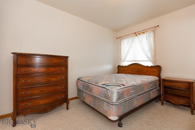 507 E Poppleton, Sheridan, MT 59749 - bedroom featuring light carpet
