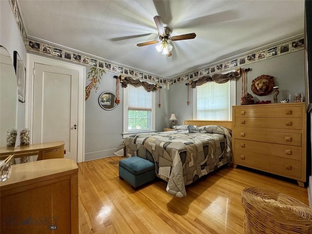 108 S 8th St, Livingston, MT 59047 - bedroom with light wood finished floors, ceiling fan, and crown molding