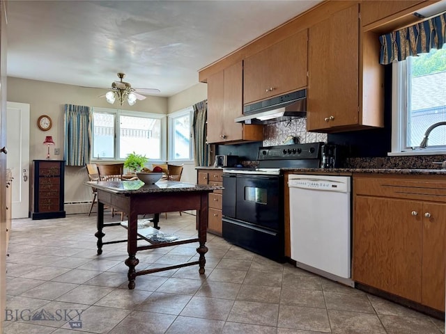 108 S 8th St, Livingston, MT 59047 - kitchen with dishwasher, black electric range oven, under cabinet range hood, a ceiling fan, and brown cabinetry