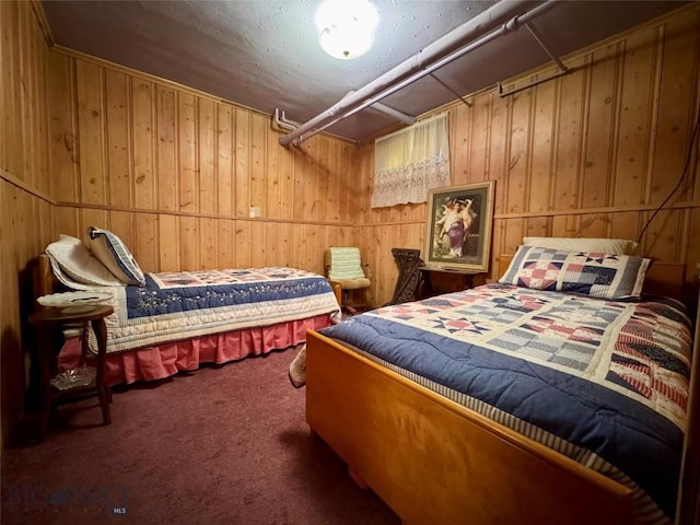 108 S 8th St, Livingston, MT 59047 - bedroom with carpet floors and wooden walls