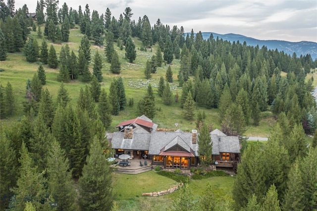 2055 Ousel Falls Rd, Big Sky, MT 59716 - aerial view of property and surrounding area with a mountain backdrop