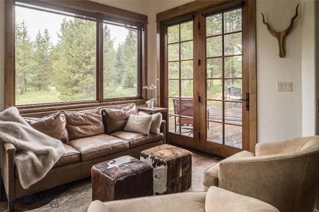 2055 Ousel Falls Rd, Big Sky, MT 59716 - sunroom / solarium featuring french doors