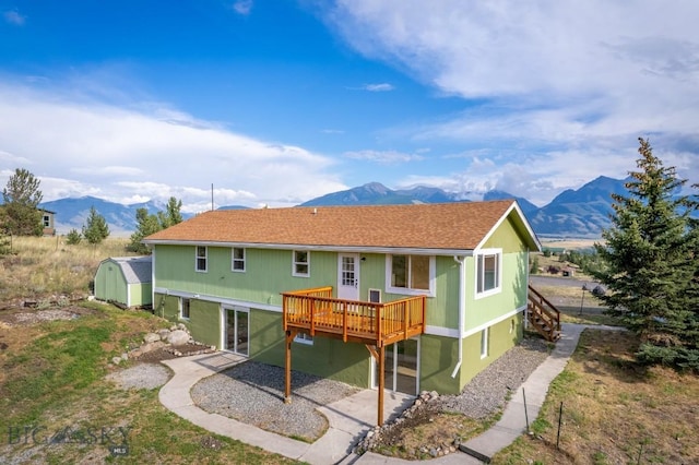 3 Evening Star Dr, Emigrant, MT 59027 - back of house with a deck with mountain view and a patio area