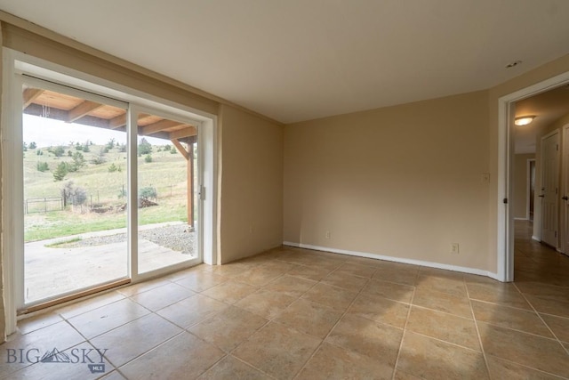 3 Evening Star Dr, Emigrant, MT 59027 - unfurnished room featuring light tile patterned floors and baseboards