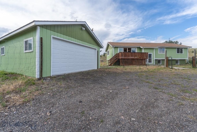 3 Evening Star Dr, Emigrant, MT 59027 - ranch-style home with a detached garage and a deck