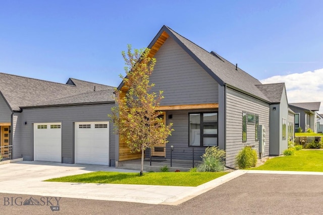 142 Albrey Trl Unit C, Bozeman, MT 59718 - contemporary house with a garage, concrete driveway, and a shingled roof