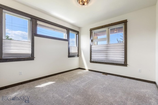 142 Albrey Trl Unit C, Bozeman, MT 59718 - carpeted spare room featuring baseboards