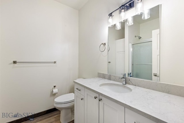 142 Albrey Trl Unit C, Bozeman, MT 59718 - full bath featuring a shower stall, vanity, and wood finished floors