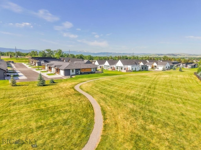 142 Albrey Trl Unit C, Bozeman, MT 59718 - view of grassy yard featuring a residential view and a mountain view