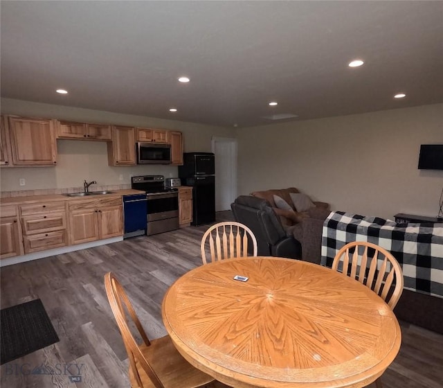 701 Barnett St, Dillon, MT 59725 - dining room featuring dark wood finished floors and recessed lighting
