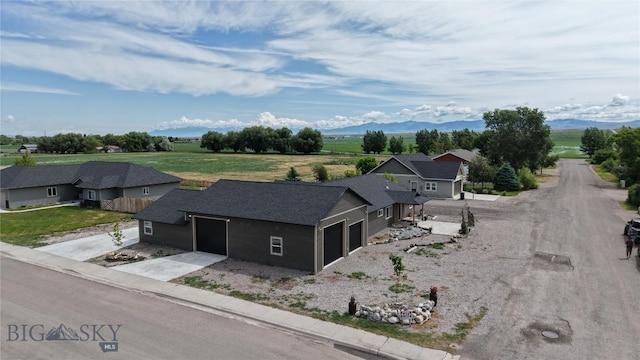 701 Barnett St, Dillon, MT 59725 - aerial view of property and surrounding area featuring a mountainous background
