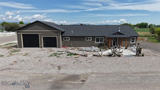 701 Barnett St, Dillon, MT 59725 - view of front of home with an attached garage