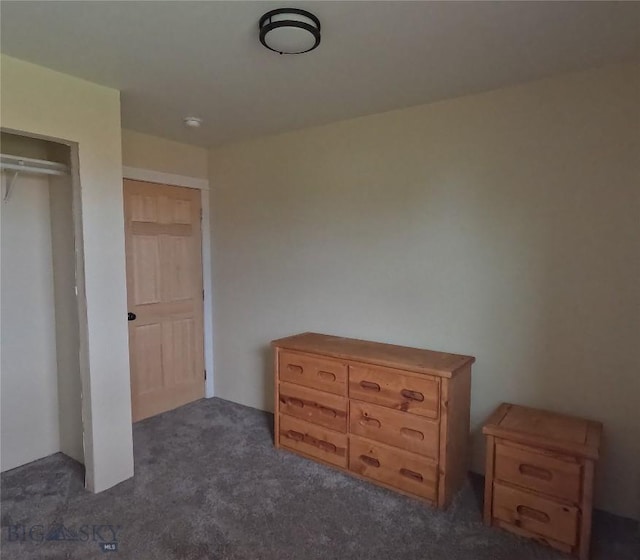 701 Barnett St, Dillon, MT 59725 - bedroom with dark carpet