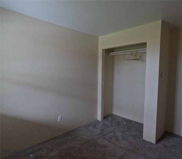 701 Barnett St, Dillon, MT 59725 - unfurnished bedroom with carpet flooring and a closet