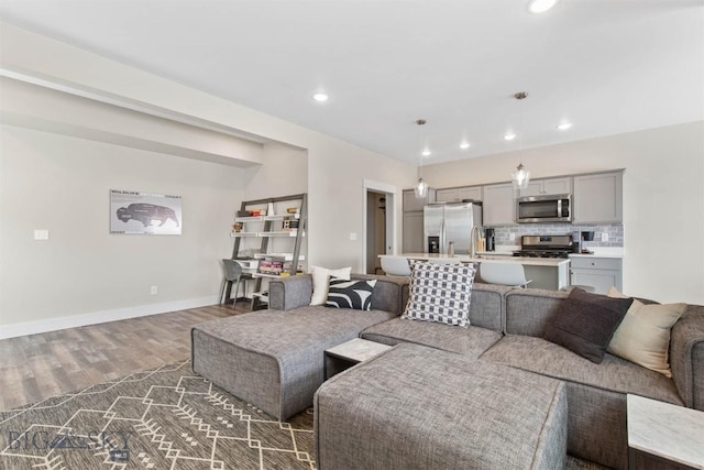 5197 Samantha Ln Unit B, Bozeman, MT 59718 - living area featuring dark wood-style floors and recessed lighting