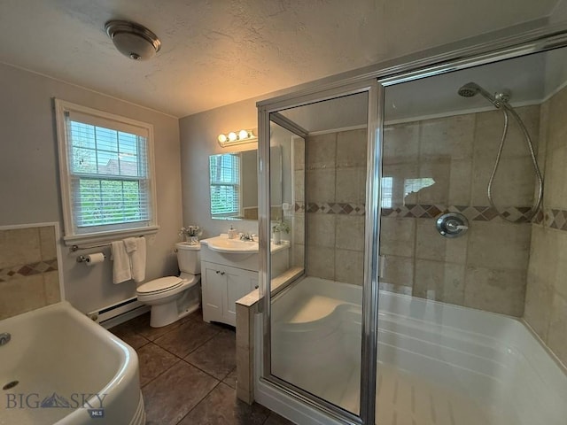 2821 Edwards, Butte, MT 59701 - bathroom featuring a stall shower, vanity, tile patterned floors, a baseboard radiator, and a bathtub