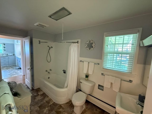 2821 Edwards, Butte, MT 59701 - full bath featuring a baseboard radiator and shower / bath combo