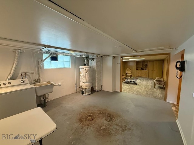 2821 Edwards, Butte, MT 59701 - below grade area featuring water heater and washer / clothes dryer