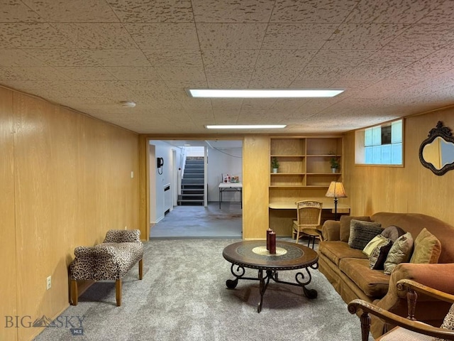 2821 Edwards, Butte, MT 59701 - living room with wood walls, stairway, and carpet