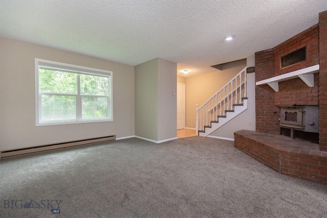 12 E Garfield St Unit D4, Bozeman, MT 59715 - unfurnished living room featuring baseboard heating, carpet flooring, stairway, a textured ceiling, and a wood stove