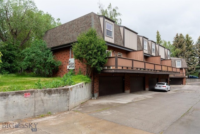 12 E Garfield St Unit D4, Bozeman, MT 59715 - view of property with driveway and an attached garage