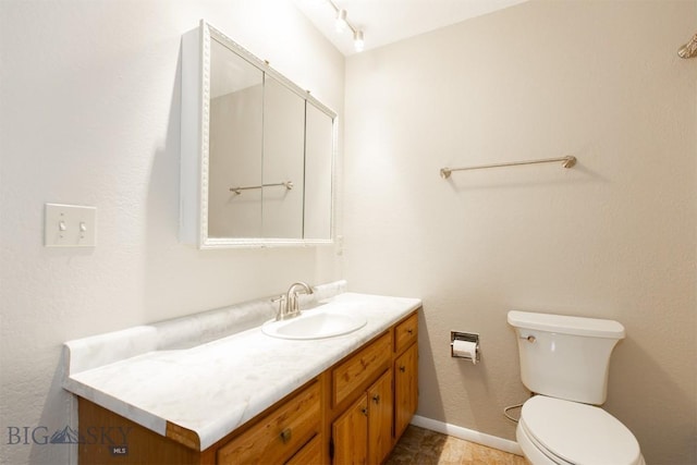 12 E Garfield St Unit D4, Bozeman, MT 59715 - bathroom featuring toilet and vanity