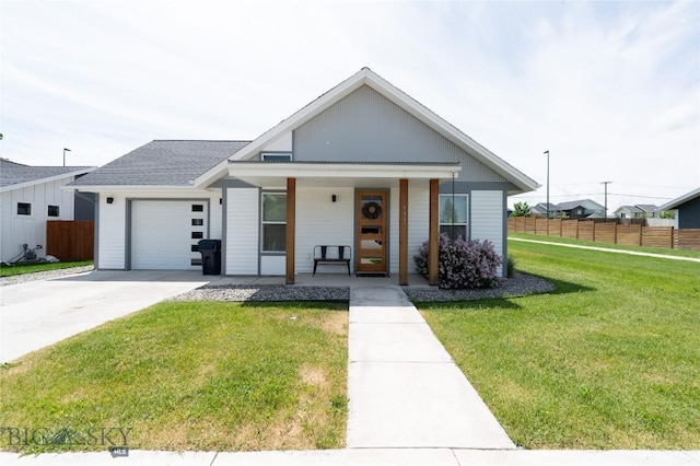 4454 Shadow Gln, Bozeman, MT 59718 - view of front of home featuring a garage, driveway, and a porch