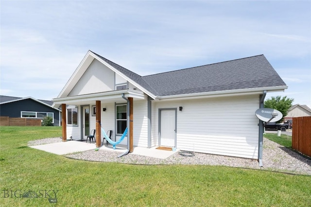 4454 Shadow Gln, Bozeman, MT 59718 - rear view of house featuring a shingled roof and covered porch
