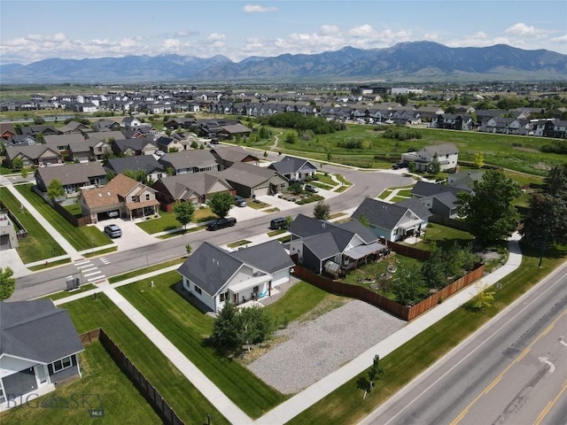 4454 Shadow Gln, Bozeman, MT 59718 - aerial view of property and surrounding area featuring nearby suburban area and a mountainous background