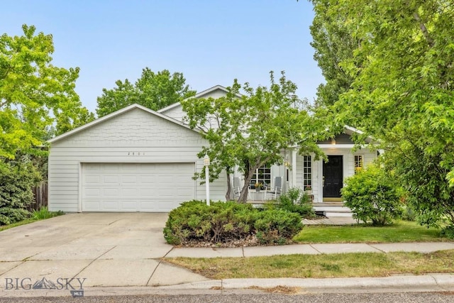 2801 W Villard St, Bozeman, MT 59718 - view of front of property featuring an attached garage and driveway