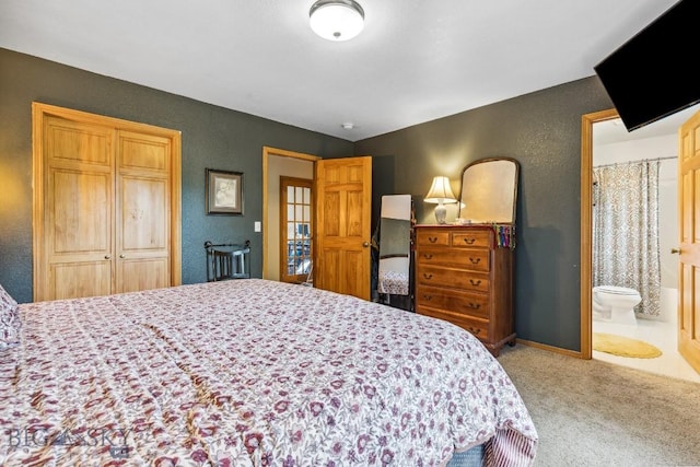 2801 W Villard St, Bozeman, MT 59718 - carpeted bedroom featuring connected bathroom and a textured wall