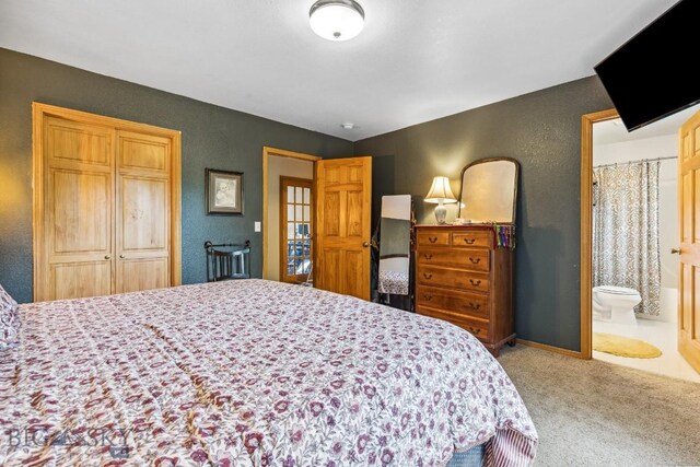 2801 W Villard St, Bozeman, MT 59718 - carpeted bedroom with ensuite bath and a textured wall