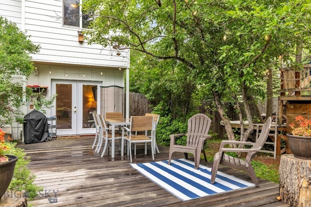 2801 W Villard St, Bozeman, MT 59718 - wooden terrace with french doors, outdoor dining space, and area for grilling