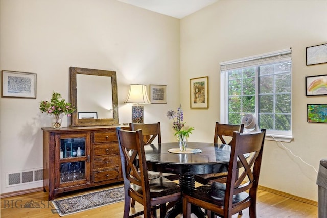 2801 W Villard St, Bozeman, MT 59718 - dining room with light wood-style flooring and baseboards