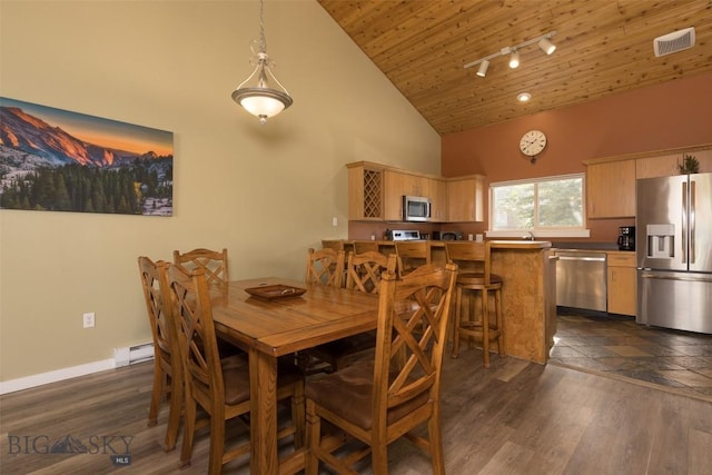 456 Firelight, Big Sky, MT 59716 - dining area with high vaulted ceiling, wood ceiling, a baseboard heating unit, track lighting, and dark wood-style flooring