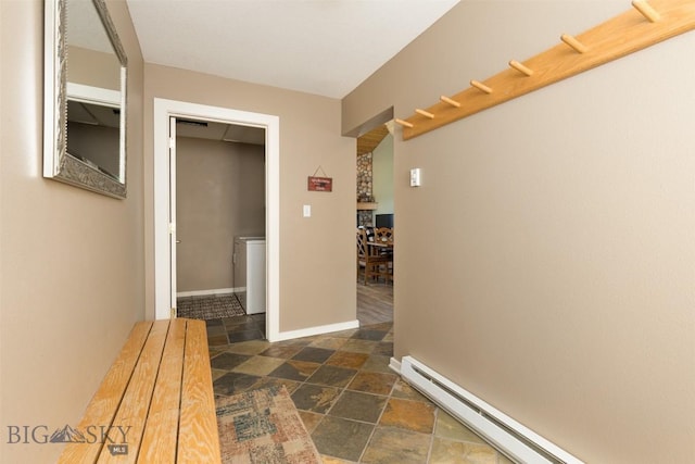456 Firelight, Big Sky, MT 59716 - hallway with baseboard heating and dark stone finish flooring