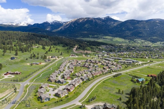 456 Firelight, Big Sky, MT 59716 - aerial perspective of suburban area featuring a mountainous background
