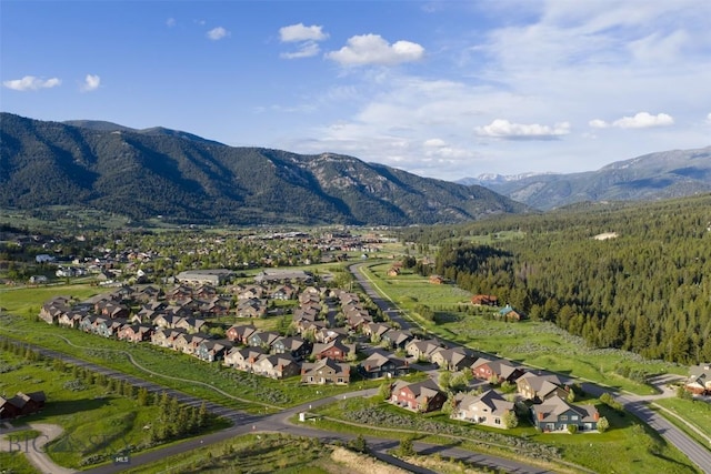 456 Firelight, Big Sky, MT 59716 - view of property location featuring a mountain backdrop and nearby suburban area