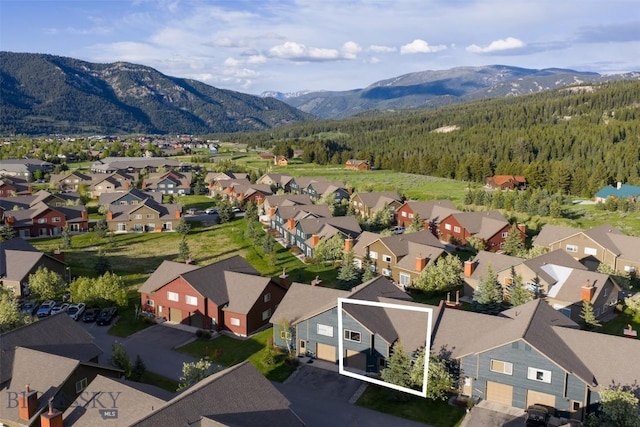 456 Firelight, Big Sky, MT 59716 - aerial view of residential area with a mountain backdrop