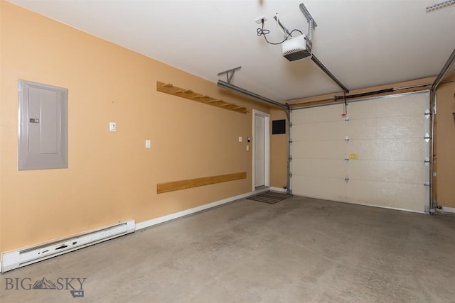 456 Firelight, Big Sky, MT 59716 - garage with electric panel, baseboard heating, and a garage door opener