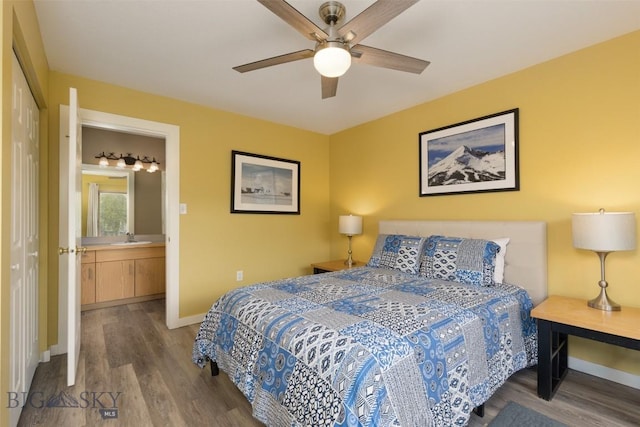 456 Firelight, Big Sky, MT 59716 - bedroom featuring wood finished floors, a ceiling fan, and ensuite bath