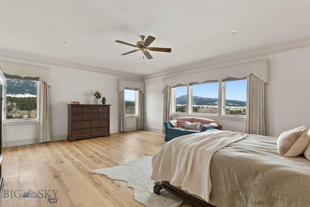 10423 Bridger Canyon Rd, Bozeman, MT 59715 - bedroom featuring ornamental molding, light wood-style floors, and a ceiling fan